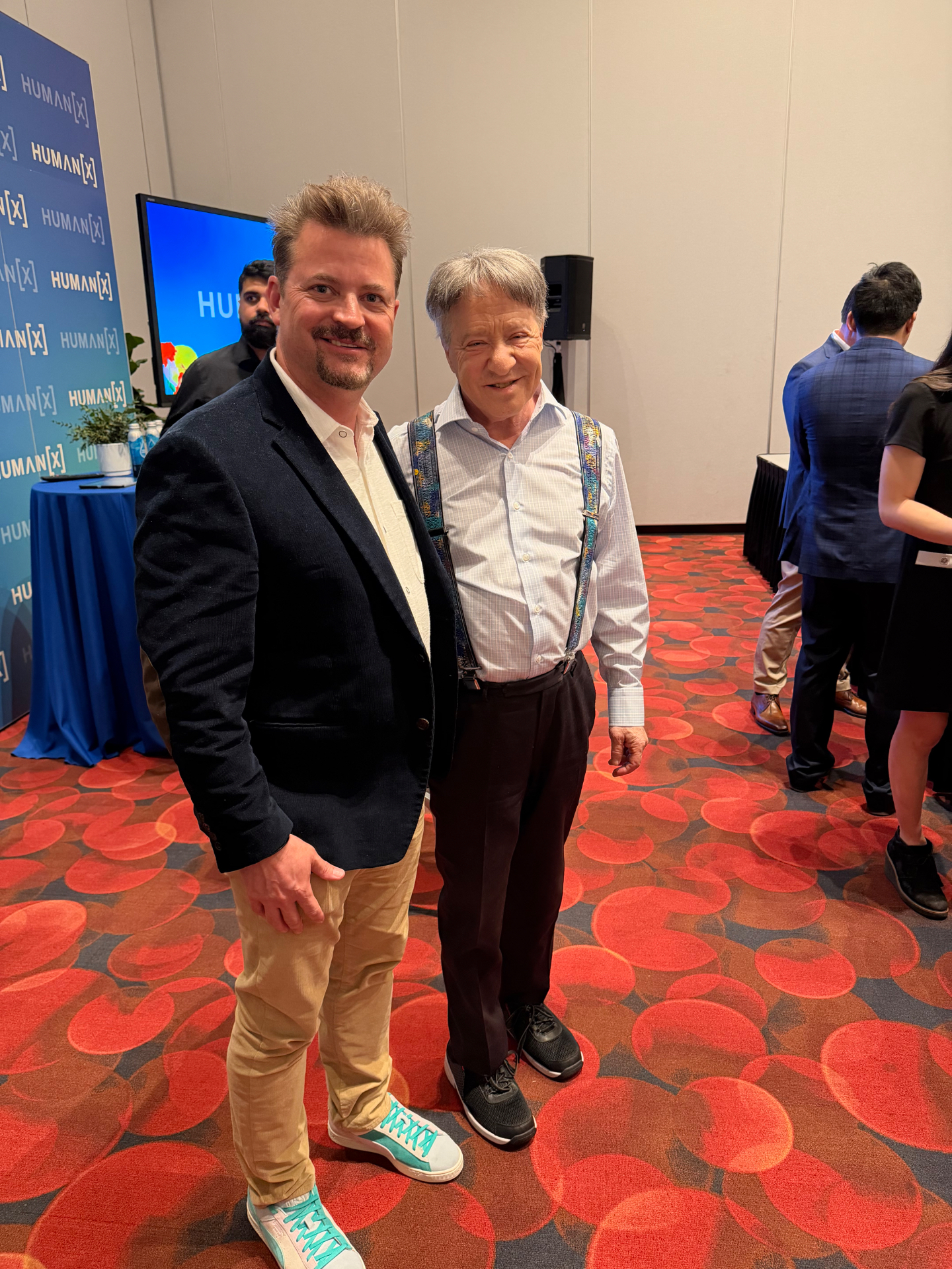 Matt Mishak with Ray Kurzweil at HumanX 2026 — full portrait