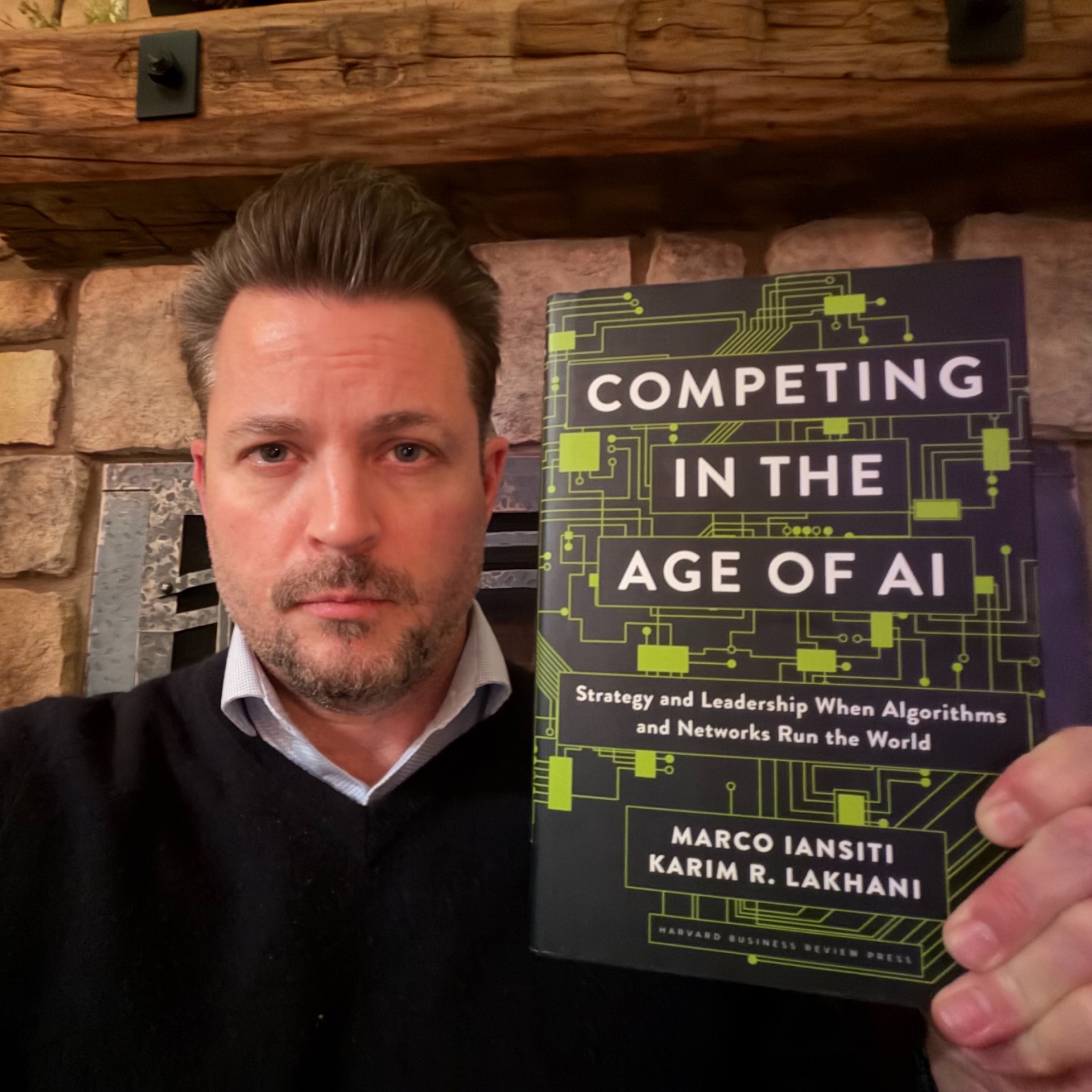 Matt Mishak with Competing in the Age of AI by Marco Iansiti and Karim R. Lakhani